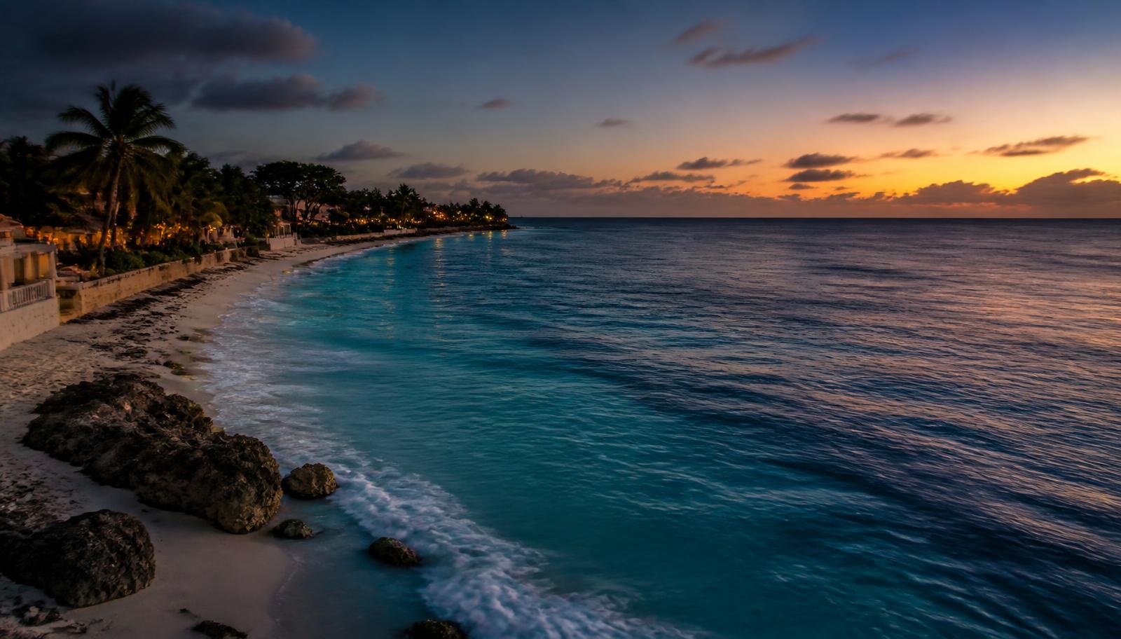Barbados beachfront coastline at dusk near the resort venue
